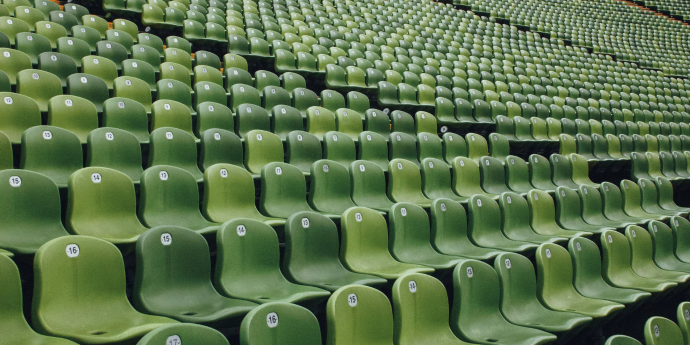 Rows of green stadium chars