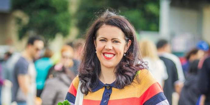 photo of Sarah Meikle at farmers market with her dog