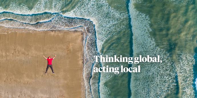 Aerial photo of man lying on a beach